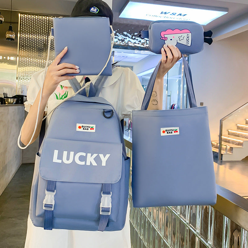 Manufacturer wholesale schoolbag female primary and secondary school students four-piece set third grade Korean version small fresh large capacity backpack to reduce the burden