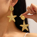 Wholesale gold earrings: european & american cross-border jewelry, creative design starfish earrings, high-end vacation style dangle earrings for women