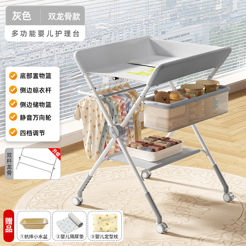 Baby changing table - newborn diaper changing, bathing, massage, and bed - foldable multifunctional baby bed