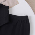 Children's clothing  fashion children's clothing black camisole + flared pants girl cross