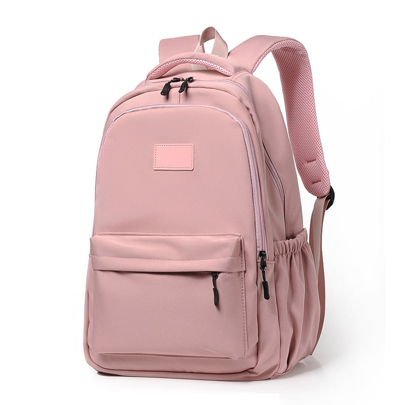 Solid color schoolbag junior high school girls high value niche large capacity ins style new primary school students light backpack women