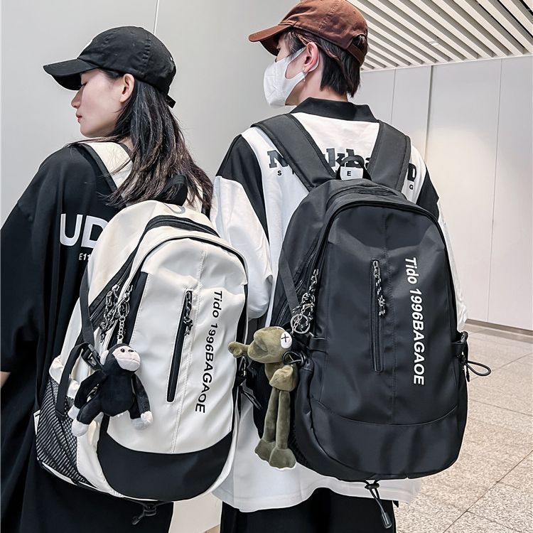 School bag male large capacity junior high school student middle school student fashion trend simple backpack female style travel bag