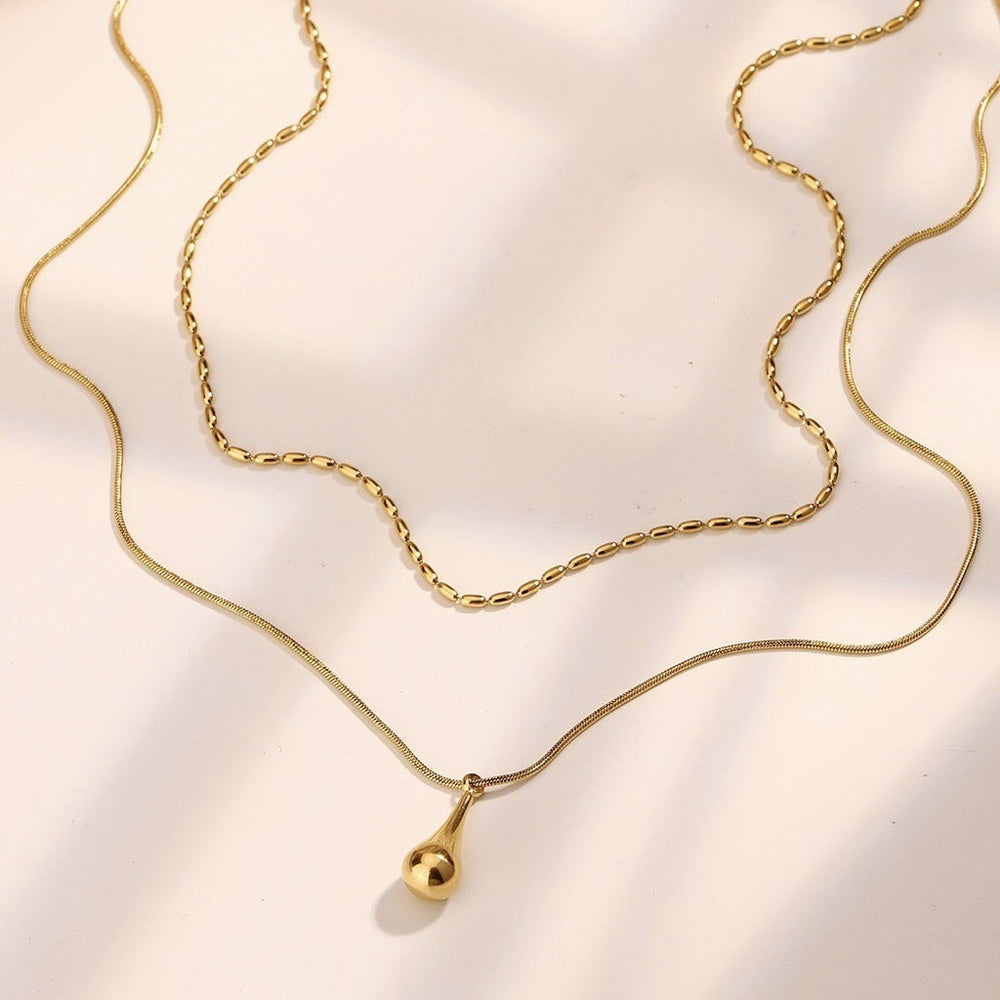 Fashionable, understated luxury: a delicate, double-layered teardrop titanium steel necklace for women. a versatile, minimalist collarbone chain that's trendy, stylish, and fade-resistant