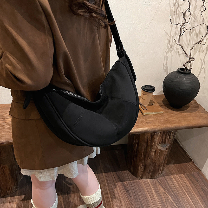 Cross-border large-capacity bag women's 2025 new fashion and simple shoulder messenger women's bag commuter casual dumpling bag