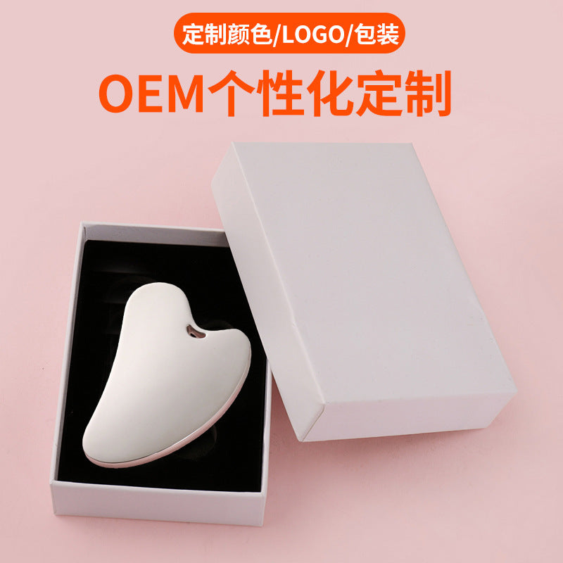 Custom zinc alloy scraping tool - heart-shaped, perforated metal fascia blade for massage and gua sha beauty treatment