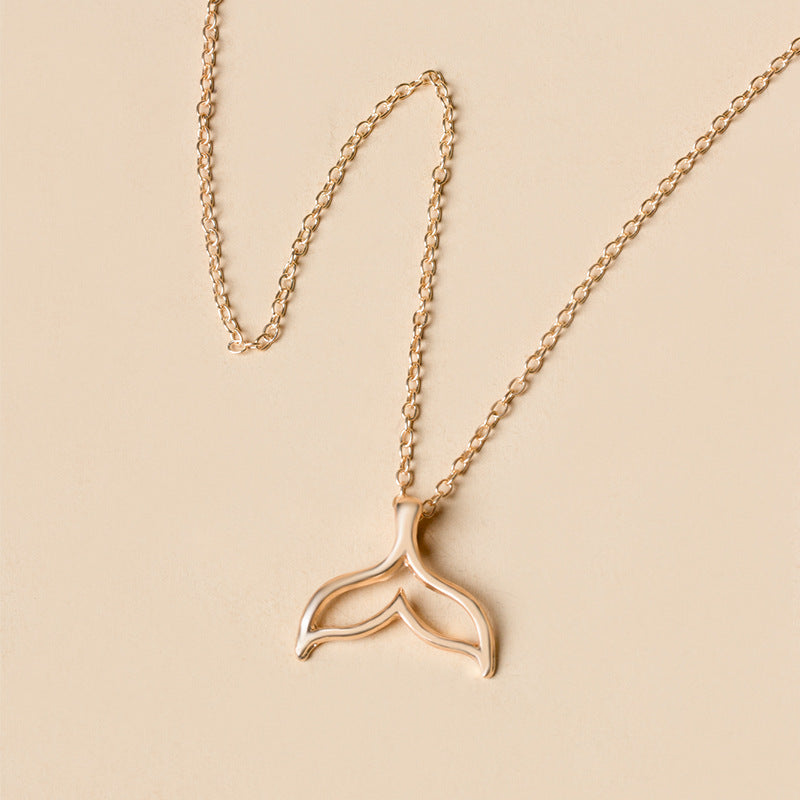 Wholesale mermaid necklace - european & american cross-border alloy jewelry - versatile dolphin tail pendant - niche, affordable luxury women's necklace