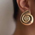 European and american cross-border jewelry: trendy ocean-inspired spiral seashell stud earrings - perfect for vacation, casual wear, and versatile metal earrings for women