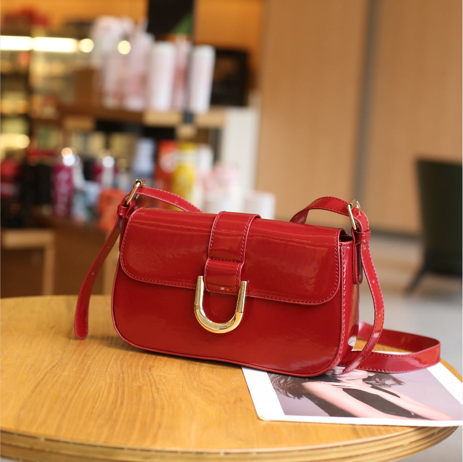 European and American business elite baguette bag 2025 summer high sense Internet celebrities with the same crossbody armpit bag PU leather shoulder bag
