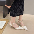 Summer women's new casualfashion style belt heeled sandals 2025 cut out studded women's pointed toe year high heels one word