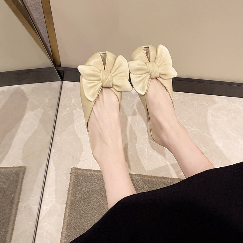 French-style slip-on mules with bow detail, new for summer 2025. unique, fairy-like, flat, retro sandals