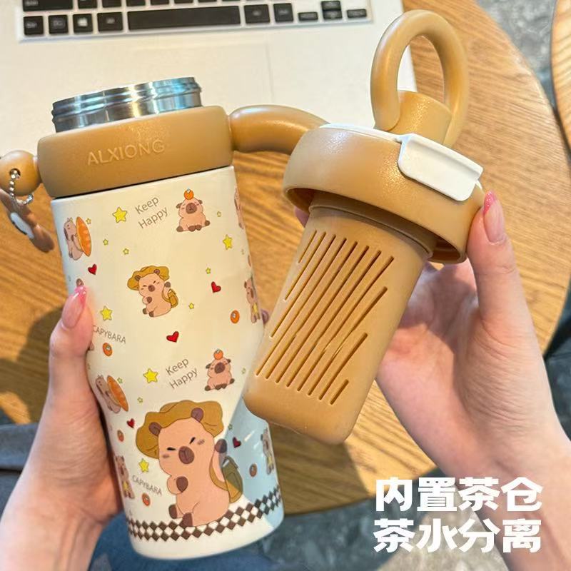 High-style 316 stainless steel insulated tumbler, perfect for outdoor use. portable, large-capacity design with a handle and straw, ideal for kids
