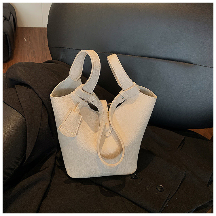 Cross-border clear sky walk goose yellow bucket bag female 2025 super fire spring and summer portable messenger bag factory delivery