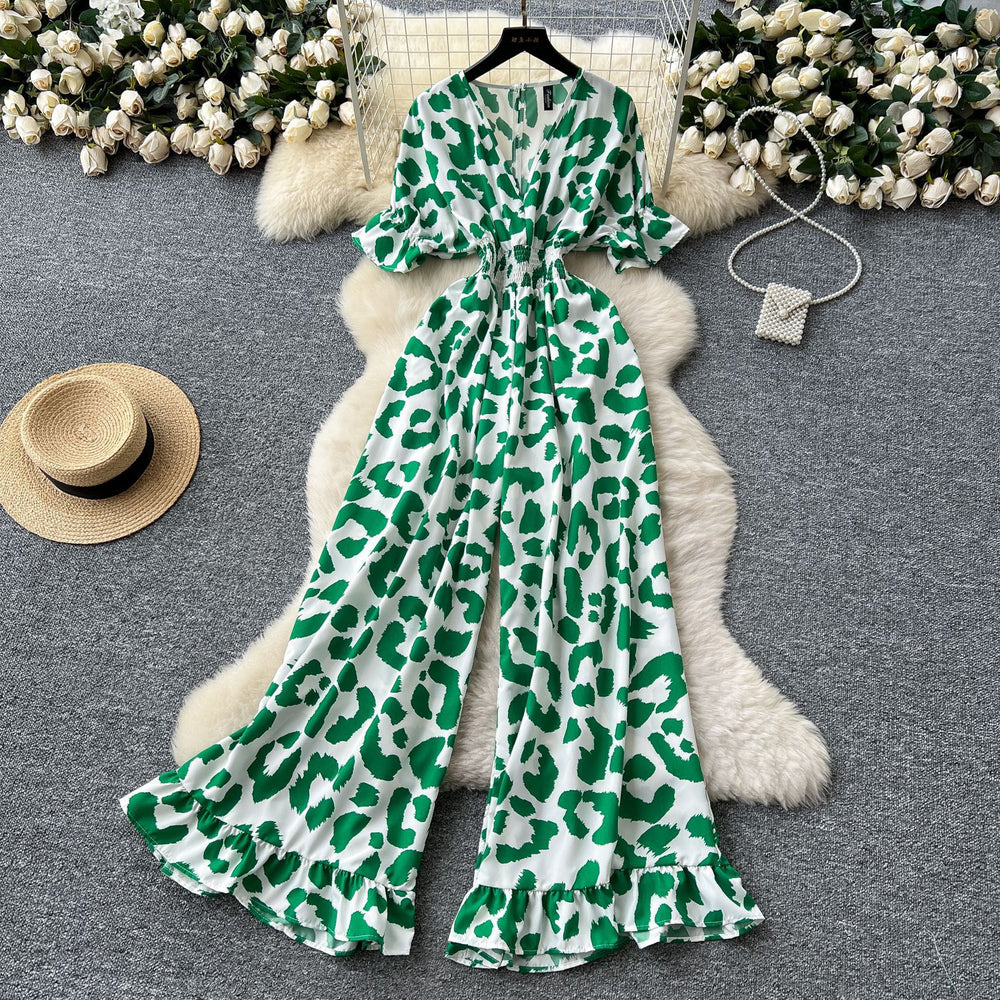 Summer vacation chic: effortless & mature casual v-neck short sleeve jumpsuit with elastic waist, high waist, slimming wide leg, and printed design