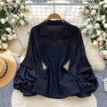 French-inspired, faux two-piece top for women, perfect for autumn. features a soft, feminine style with pleated lantern sleeves and a flattering, slim-fit design. a trendy and chic blouse