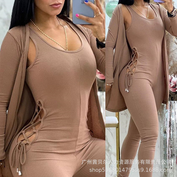 ODF2595 European and American women's clothing solid color cardigan + hollow strap slim jumpsuit (2-piece set)