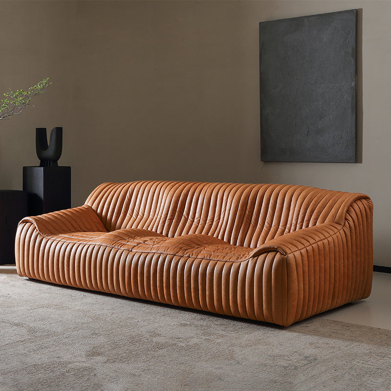 Minimalist mid-century modern genuine leather sofa for living room, homestay, designer american retro oil wax leather caramel color wavy sofa