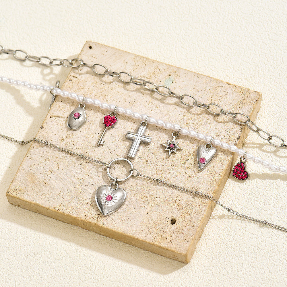 Wholesale faux pearl bowknot heart necklace - european & american cross-border fashion, sweet & cool, spicy girl style, cross pendant accessories