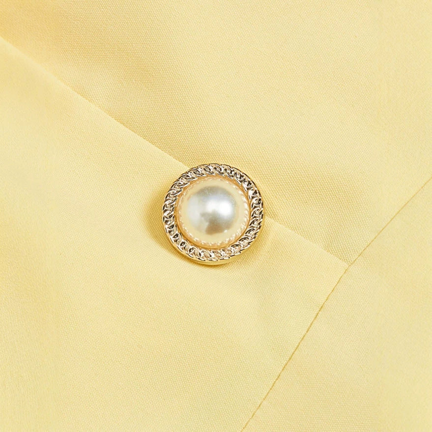 new european and american style cream yellow square neck sleeveless dress with pearl button detail, cinched waist, and pleated midi skirt