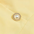 new european and american style cream yellow square neck sleeveless dress with pearl button detail, cinched waist, and pleated midi skirt