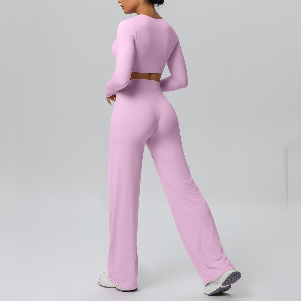 High-waisted, straight-leg, wide-leg, quick-drying yoga set with built-in bra pads, featuring a cropped, long-sleeved design. perfect for outdoor running and fitness activities for women