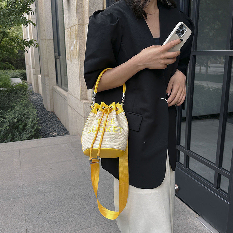Woven handbag small bag women's new straw bucket bag summer popular niche style shoulder crossbody bag cylinder