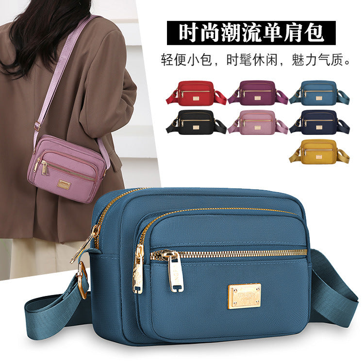 Portable commuter small square bag multi-layer storage business cashier bag simple and durable Oxford cloth shoulder messenger bag wholesale