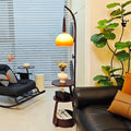 Medieval style living room fishing floor lamp next to the sofa classy bedroom bedside table storage accessible luxury atmosphere table lamp