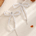 European and american cross-border retro trend imitation pearl earrings - unique irregular bow chain tassel beaded stud earrings for women