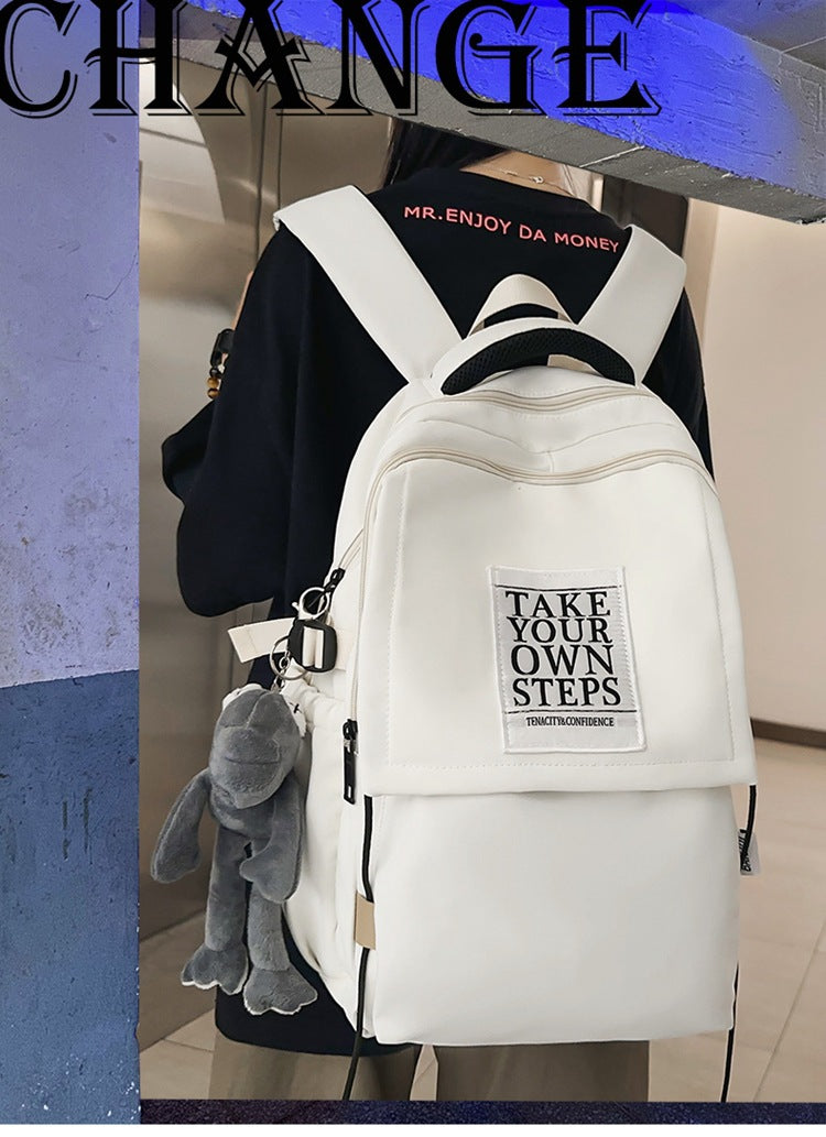 Stylish commuter backpack: high-capacity, aesthetic, minimalist design for women - perfect for middle school, high school, and college students. ideal for travel, casual use, and versatile styling
