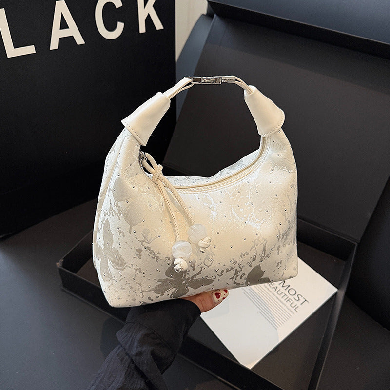 New Chinese style national style portable small bag women's 2025 summer new bento bag design sense personalized commuter messenger bag