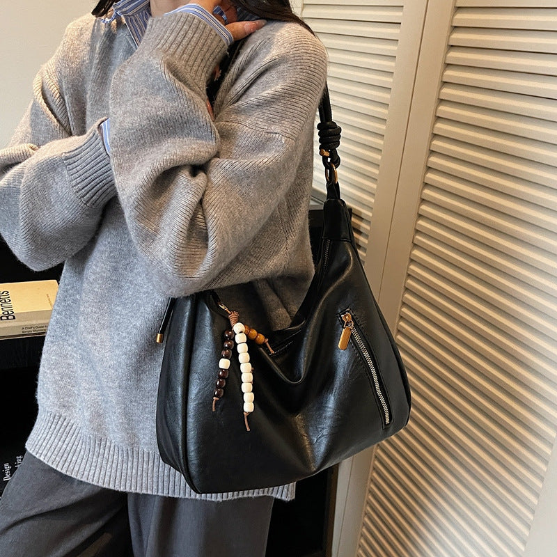 Crossbody bag 2025 new autumn/winter versatile light luxury niche high-value shoulder bag large capacity commuter tote women's bag