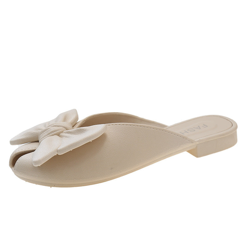 French-style slip-on mules with bow detail, new for summer 2025. unique, fairy-like, flat, retro sandals