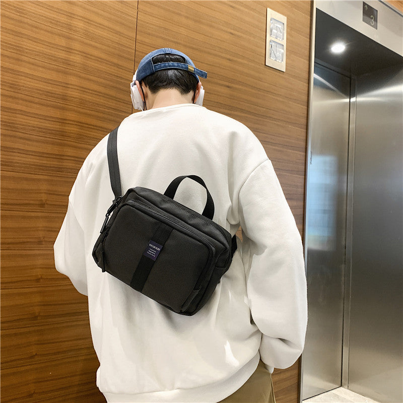 Cross-border new trendy men's messenger bag, simple function bag, multi-functional digital storage bag, outdoor breast bag, shoulder bag.