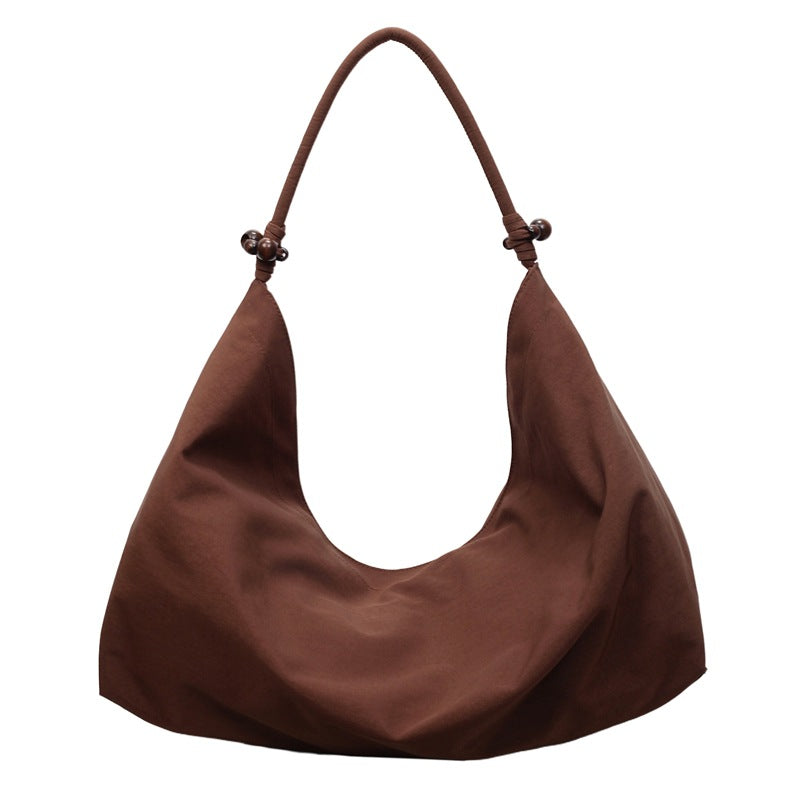Simple and stylish large-capacity tote bag for women, a trendy new arrival for autumn and winter. perfect as a fabric bag for travel, leisure, and everyday use, or as a shoulder bag