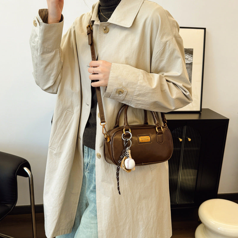 Spring new trend casual shoulder handle women's Korean version fashion commuter women's messenger bag versatile bowling bag