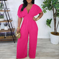 C8592  foreign trade  new european and american cross-border fashion v-neck high-waisted solid color sexy pleated jumpsuit