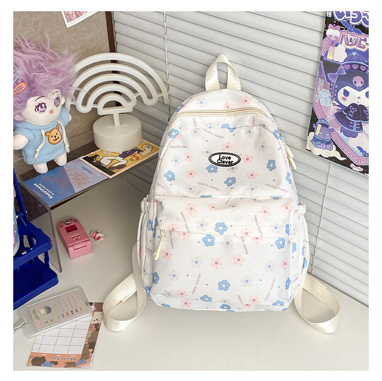 Niche original floral design schoolbag high value large capacity lightweight versatile backpack travel attendance backpack