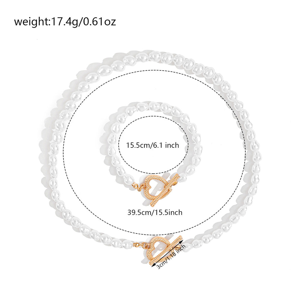 Trendy and versatile irregular pearl necklace and bracelet set – a sweet and sophisticated design with a heart motif. hot-selling cross-border jewelry