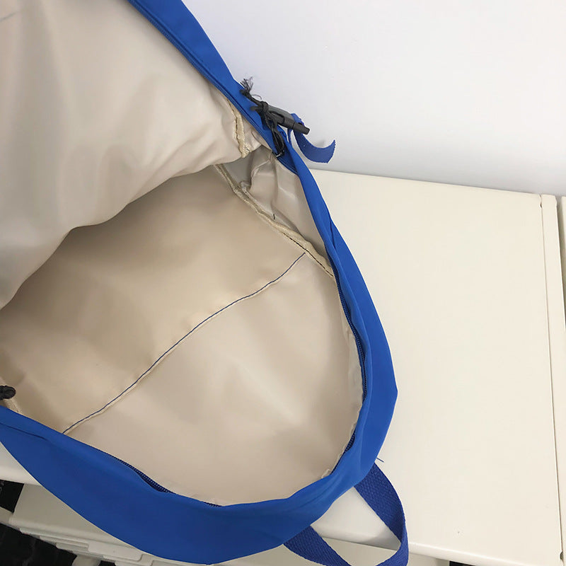 New trendy fashion backpack, the same for men and women, Korean version of campus student schoolbag, large-capacity Japanese computer backpack