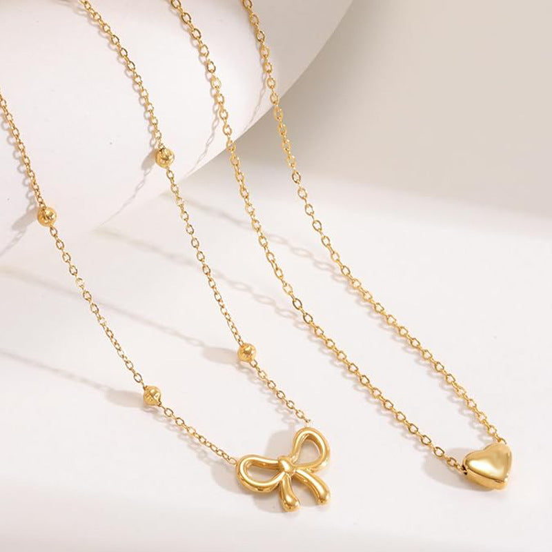 Amazon's new fashionable heart & butterfly double-layer necklace - women's heart-shaped pendant rice bead choker
