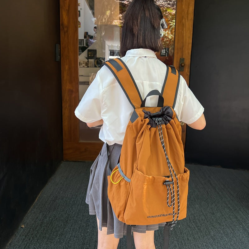 New Korean version drawstring retro backpack, lightweight and trendy junior high school student schoolbag, sports outdoor travel backpack