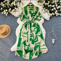 Niche stylesense of designprintingdressfemalenew arrivalsummer tie backwaist slimming lookmedium longvacation skirt