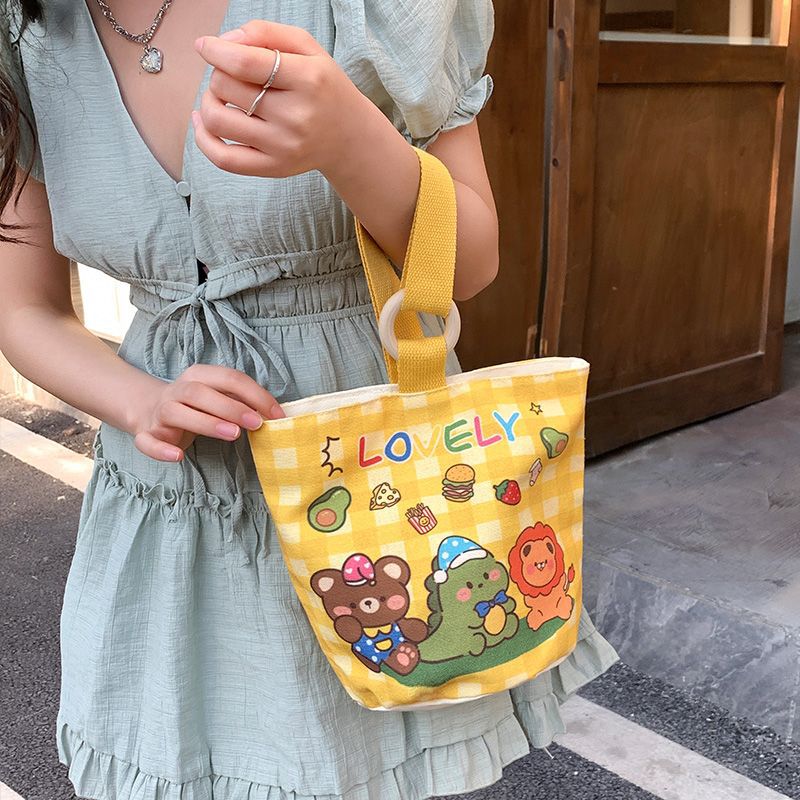 Cute cartoon canvas tote bag for women, 2024 new style handheld bucket bag, large capacity lunch bag, fashionable cloth handbag
