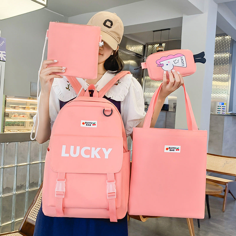 Manufacturer wholesale schoolbag female primary and secondary school students four-piece set third grade Korean version small fresh large capacity backpack to reduce the burden