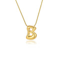 Amazon bestseller: premium bubble 26-letter gold pearlized necklace pendant - stylish women's accessory