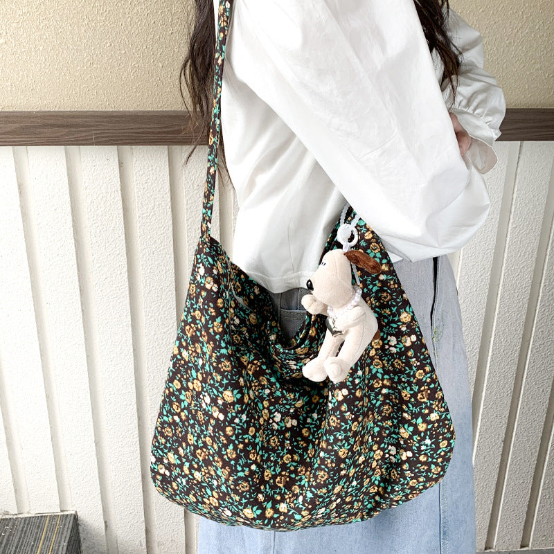 Cross-border new broken flower canvas bag messenger bag shopping bag fashion trend large capacity casual versatile women's shoulder bag