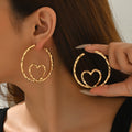 Wholesale gold earrings: european & american cross-border jewelry accessories - new, niche, light luxury, high-end, minimalist hoop & heart drop earrings for women