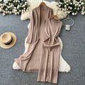 Elegant and chic: oversized knit cardigan with midi length + sleeveless bodycon dress with metallic buckle detail