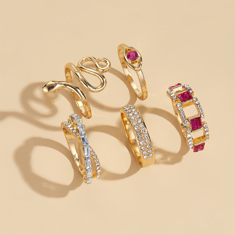 Wholesale alloy rings: european & american cross-border, niche, high-end jewelry - diamond-accented snake ring set, stackable women's accessories