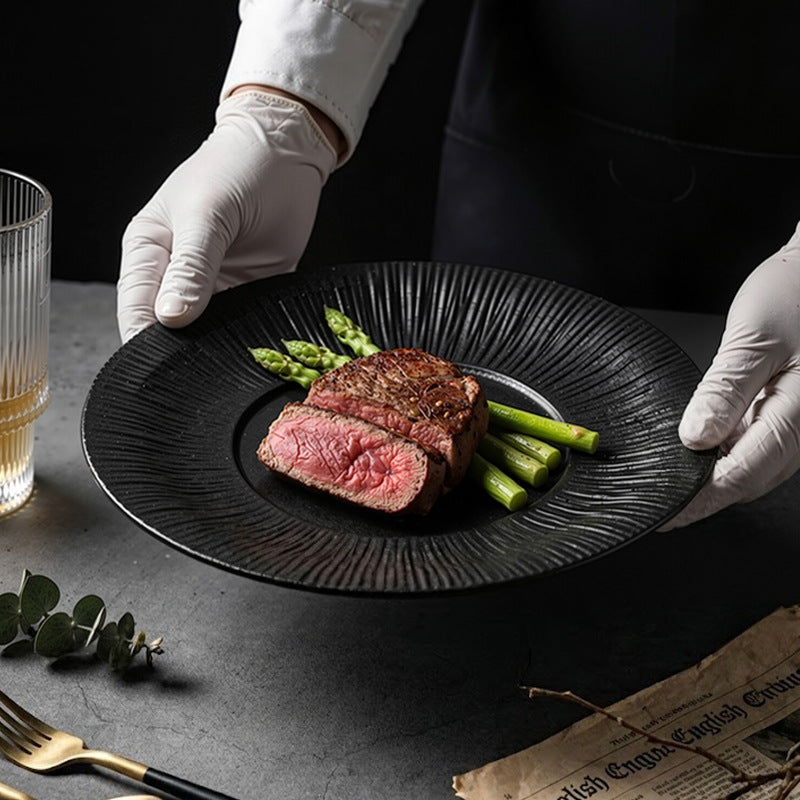 Nordic minimalist black and white ceramic steak plate - western dinner plate for restaurant, home, and hotel use - flat plate with unique creative presentation